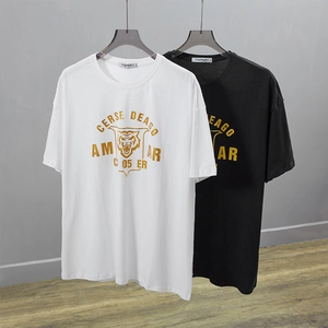 Oversized black and white cotton T-shirts with gold foil tiger head shield prints