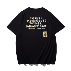 Oversized black cotton T-shirt featuring gothic typography and vintage tiger brand patch