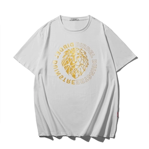 White cotton t-shirt featuring a golden geometric lion print with letter graphics