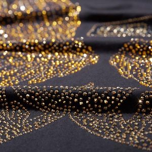 Men's oversized black T-shirt with golden rhinestone print patterns and loose fit