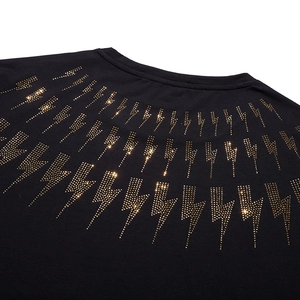 Black oversized cotton t-shirt featuring golden lightning bolt rhinestone pattern on back