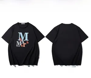 Flat lay of oversized black T-shirt showing front and back view with street style prints