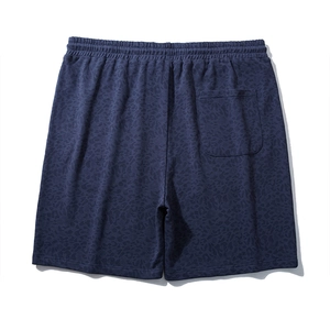 Men's navy casual shorts with dark animal print, elastic waist and back pocket detail