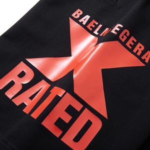 Men's loose black shorts with large red letter print and street style graphic