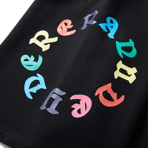 Men's oversized black athletic shorts with colorful ADRER gothic ring graphic print