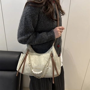 Fashionable sage green crossbody tote bag with gold chain and pearl accents for women