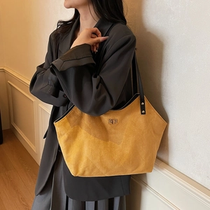 Quilted yellow suede tote bag with black straps for women stylish autumn shoulder bag