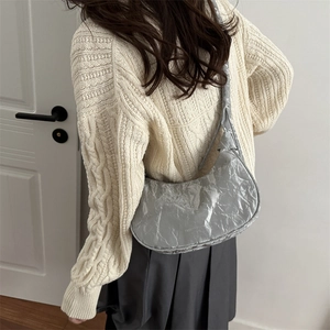 Silver metallic dumpling shoulder bag for women with pleated design for 2025 fashion trend