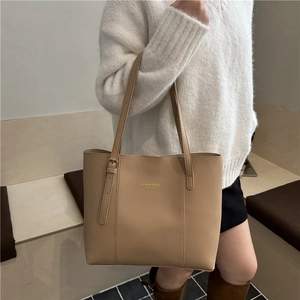 Chic khaki faux leather tote bag for women with gold lettering for a casual autumn look