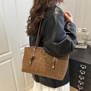 Elegante borsa tote leopardata da donna con manico a nodo dal design minimalista chic