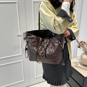 Retro dark brown tote bag with embossed bow patterns for women's daily casual style