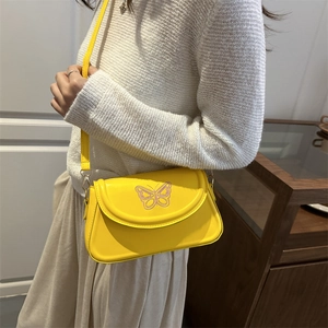 Yellow faux leather crossbody bag with a purple butterfly design for women's fashion