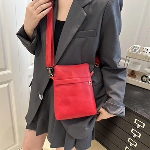 Chic red lychee grain leather crossbody phone bag with wide strap and gold hardware