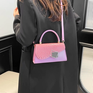 Pink and lilac crossbody bag with crocodile texture flap and silver geometric buckle