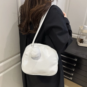 Glossy white faux leather shoulder bag for women with a cute plush charm accessory