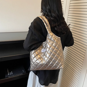 Silver quilted puffer tote bag for women with metallic finish and large capacity
