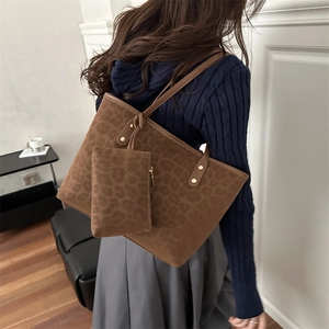 Stylish brown leopard print tote bag with small matching pouch for woman commuting