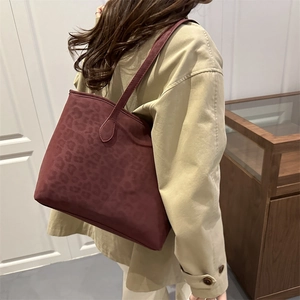 Burgundy leopard print tote bag in matte suede with long leather shoulder straps