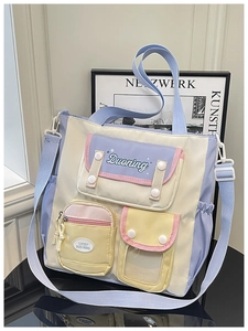 Détail du fourre-tout en nylon à poches multiples avec pochette pour téléphone
