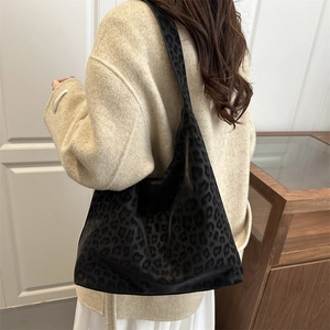 Retro grey leopard print tote bag with large capacity shown in a stylish shoulder carry