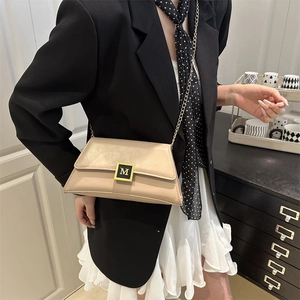 Fashionable beige leather crossbody chain bag with a gold letter M buckle for women