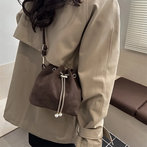 Vintage frosted bucket bag with chain drawstring and pearl accents in dark brown