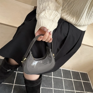 Chic gray patent leather hobo bag with sleek mirror finish for women's daily fashion