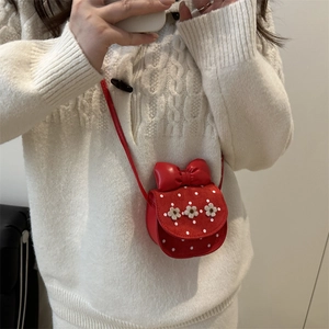 Red children's crossbody bag with polka dots and 3D floral embroidery for girls