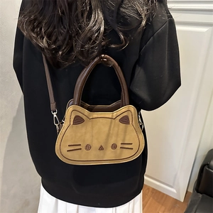 Minimalist cartoon cat crossbody bag in khaki matte fabric with embroidery and leather strap