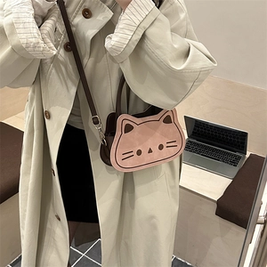 Cute pink and brown cat-shaped crossbody bag with soft faux fur and leather details