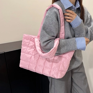 Pink quilted shoulder tote bag in satin finish nylon with wide straps for women