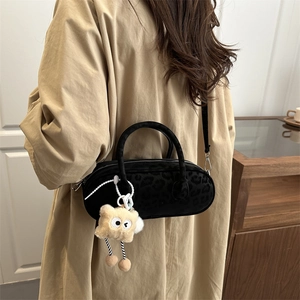 Chic black leopard texture pillow bag for women with cute star plush keychain pendant