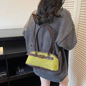 Retro avocado green suede baguette bag with brown leather straps and metal buckle
