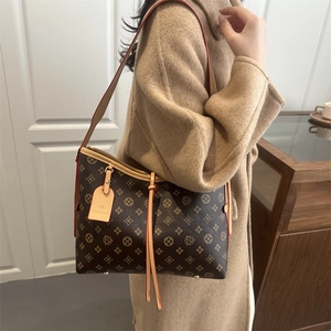 Classic brown monogram tote bag with leather straps and tassels for casual commute