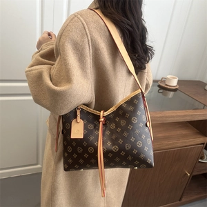 Classic vintage hobo tote bag with geometric pattern and leather straps in retro style