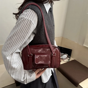 Retro dark red patent leather shoulder bag with white contrast stitching for women
