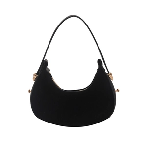 Minimalist black suede hobo shoulder bag with half-moon shape and gold hardware