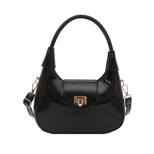 Glossy black patent leather hobo bag with gold buckle and detachable shoulder strap