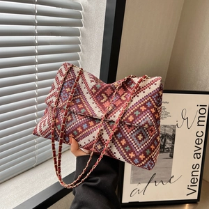 Ethnic woven shoulder bag with geometric patterns and red leather gold chain strap