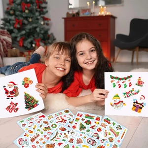 Kids wearing festive Christmas stickers featuring Santa, snowmen and reindeer patterns
