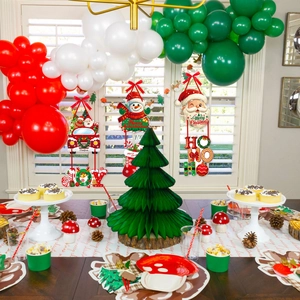 Christmas party decoration set with Santa ornaments, paper trees and holiday tableware