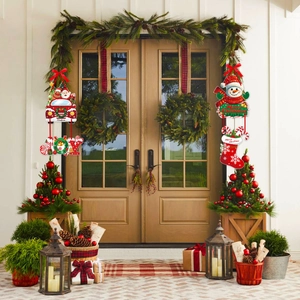 Christmas door hanging ornaments featuring Santa, reindeer car and Snowman JOY signage