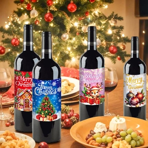 Close-up of four festive Merry Christmas wine bottle labels with holiday table decor