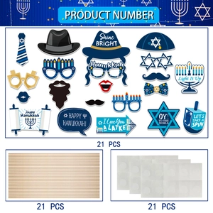 Detailed view of 21-piece Hanukkah photo booth props with sticks and glue dots set