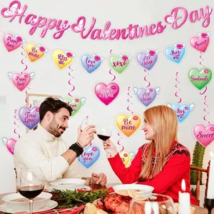 Valentine's Day banner and colorful heart spiral hangings for romantic party decoration