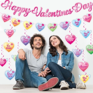 Close-up of Valentine's Day hanging swirls and heart banners for party ceiling decoration