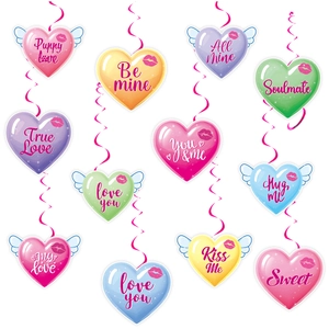 Close-up of colorful Valentine heart swirl hanging decorations with romantic short phrases