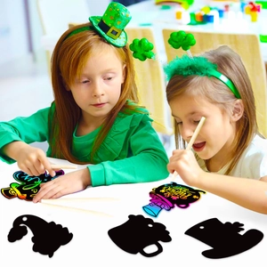St. Patrick's Day clover scratch art kit for kids featuring DIY lucky charms and wooden tools