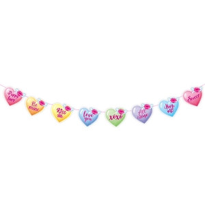 Close-up of Valentine's colorful heart garland with Puppy love and Be mine text banners