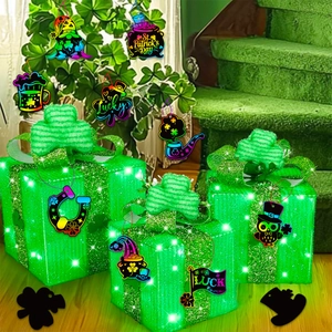 Macro detail of St. Patrick's Day scratch art ornaments featuring rainbow shamrock designs